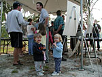 Dan Miller, from the Installation Restoration Program, provides information to a concerned citizen regarding the Snake Pond investigations, while the kids enjoyed the other "part" of the June 2002 "Ice Cream and Information" event at Snake Pond.