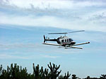 A helicopter used to perform arborne magnetometer surveys, which detect magnetic objects located on, or below, the ground surface